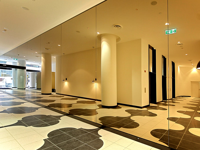 Hallway with tinted glass walls